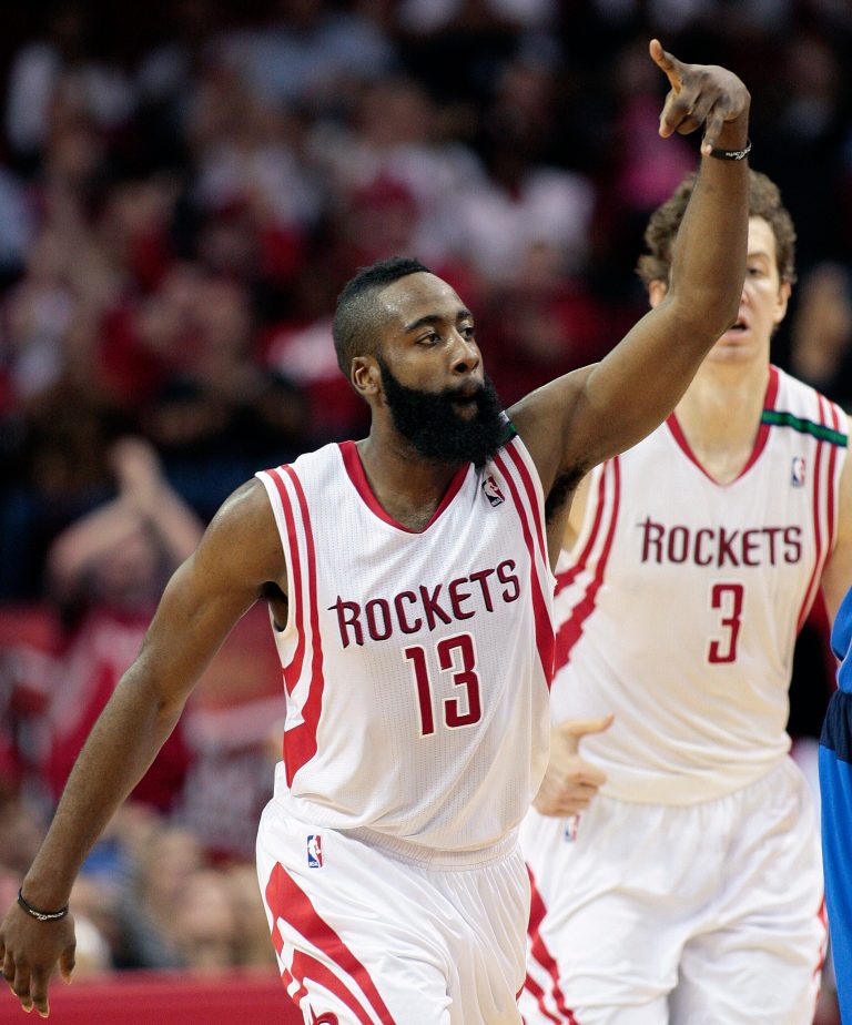   Houston Rockets' James Harden (13) motions after hitting a three-point shot against the Dallas Mavericks during the first half of an NBA basketball game, Saturday, Dec. 8, 2012, in Houston. (AP Photo/Bob Levey)  