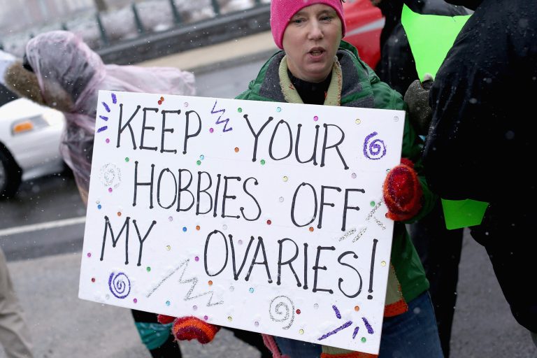 Demonstrators rally outside of the U.S. Supreme Court during oral arguments in Sebelius v. Hobby Lobby March 25, 2014 in Washington, DC. (Photo by Chip Somodevilla/Getty Images)