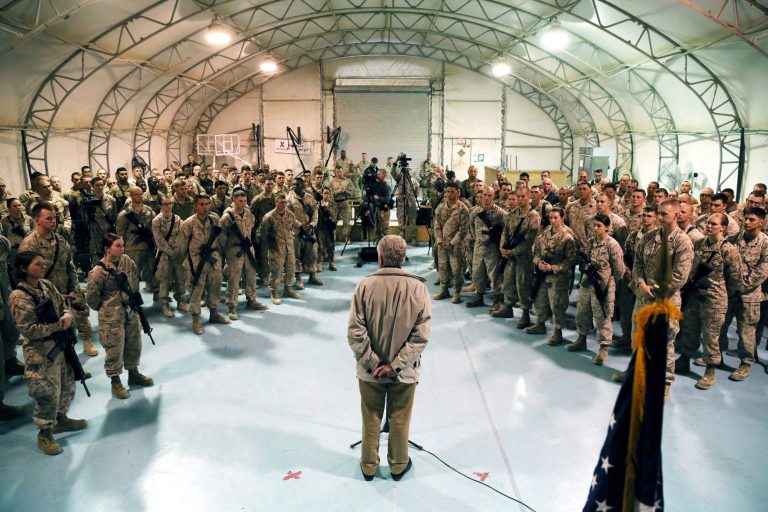 In this Dec. 8, 2013 file photo, Defense Secretary Chuck Hagel speaks with U.S. troops at Camp Bastion, Afghanistan. The latest Pentagon budget proposal, outlined Monday by Hagel, proposed cutting the Army to 450,000 soldiers or less -- the lowest level since 1940 -- as fighting in Afghanistan winds down. (AP Photo/Mark Wilson, Pool-File)
