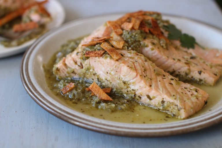 Congress prohibited the Food and Drug Administration from introducing foods containing genetically engineered salmon for interstate commerce as part of a $1.1 trillion spending bill released early Wednesday. (AP Photo)