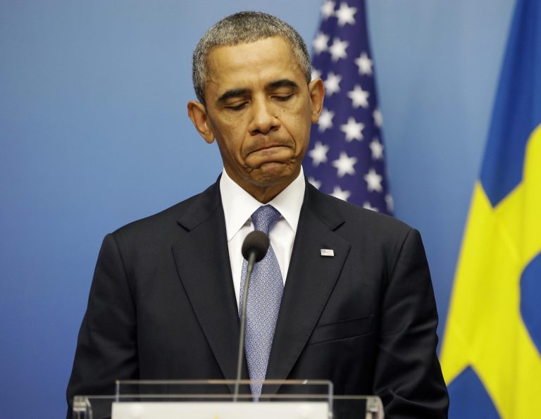 In the face of opposition from the American public and deep skepticism on Capitol Hill, Obama took his now-famous walk with Chief of Staff Denis McDonough in which he decided to follow Britain's lead and seek congressional approval before deciding whether to act alone. (AP Photo/Pablo Martinez Monsivais)