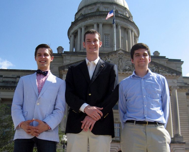  In this May 24, 2012, photo, John Ramsey, center, accompanied by Preston Bates left, and Doug Lusco, right, young Republicans involved in the Liberty For All political group, stand in front of the state Capitol in Frankfort, Ky. John Ramsey stands out in a new campaign finance world order filled with big names like Republican casino mogul Sheldon Adelson and Democratic Hollywood producer Jeffrey Katzenberg. The little-known senior at Stephen F. Austin University.is the founder of a team of college-aged Republicans that liberals have dubbed the âBrat PAC,â which helped propel one congressional candidate to victory and intends to get involved in other House races. And heâs just the latest wealthy individual to try to influence federal elections in the wake of a series of federal court decisions that deregulated the campaign finance system and dramatically changed the countryâs political landscape. (AP Photo/Roger Alford)  