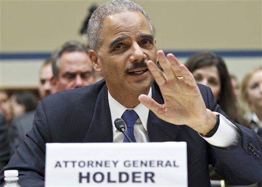 Attorney General Eric Holder testifies on Capitol Hill in Washington, Thursday, Feb. 2, 2012, before the House Oversight and Government Reform Committee hearing entitled, 