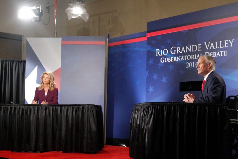 Texas State Senator Wendy Davis, left, and Texas Attorney General Greg Abbott prepare to answer questions during the Rio Grande Valley Gubernatorial Debate Friday, Sept. 19, 2014 at the Edinburg Conference Center at Renaissance in Edinburg, Texas. The debate was the first of two scheduled before the November election. (AP Photo/The Monitor, Gabe Hernandez, Pool)