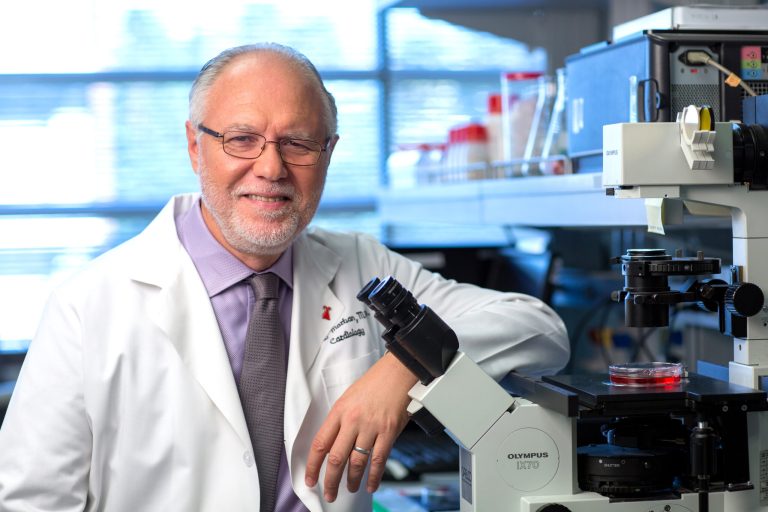 This handout photo provided by Cedars-Sinai, taken in Feb. 2014, shows Dr. Eduardo Marban, director of the Cedars-Sinai Heart Institute in Los Angeles. No batteries required: Scientists are creating a biological pacemaker, by injecting a gene into the hearts of sick pigs that changed ordinary cardiac cells into a special kind that induce a steady heartbeat. The study, published Wednesday, is one step toward developing an alternative to electronic pacemakers that are implanted into 300,000 Americans a year.