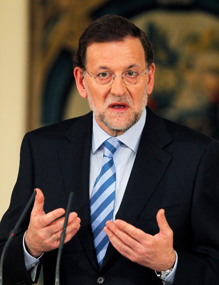   Spain's Prime Minister Mariano Rajoy gestures during a press conference at the Moncloa Palace, in Madrid, Sunday, June 10, 2012. Spain became the fourth and largest country to ask Europe to rescue its failing banks, a bailout of up to 100 billion euros ($125 billion) that leaders hoped would stabilize a financial crisis that threatens to break apart the 17-country eurozone. (AP Photo/Andres Kudacki)  