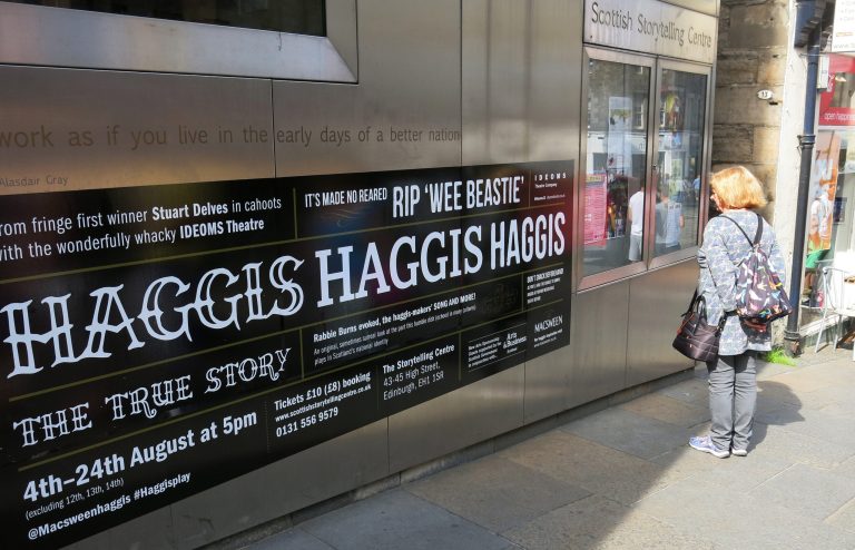 In this picture taken Monday, July 28, 2014, a sign advertises a play called 