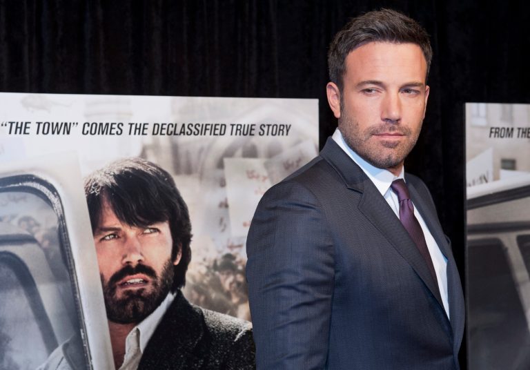 Director and actor Ben Affleck poses for photographers at the premiere of his film Argo in Washington. Argo is based on covert operation to rescue six Americans during the Iran hostage crisis in 1979. (AP Photo/Cliff Owen)