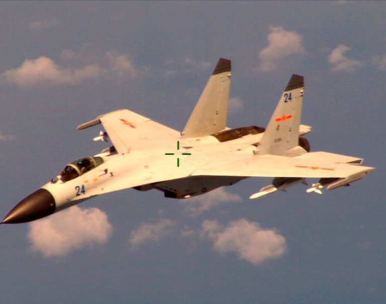 A Chinese fighter jet that the Obama administration said Friday conducted a 