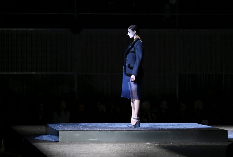 A model wears a creation for Prada women's Fall-Winter 2014-15 collection, part of the Milan Fashion Week, unveiled in Milan, Italy, Thursday, Feb. 20, 2014. (AP Photo/Antonio Calanni)