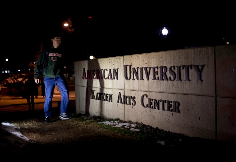 Students walk freely about the American University Campus near the Katzen Arts Center in Washington, Wednesday, Dec. 11, 2013. (AP Photo/Carolyn Kaster)