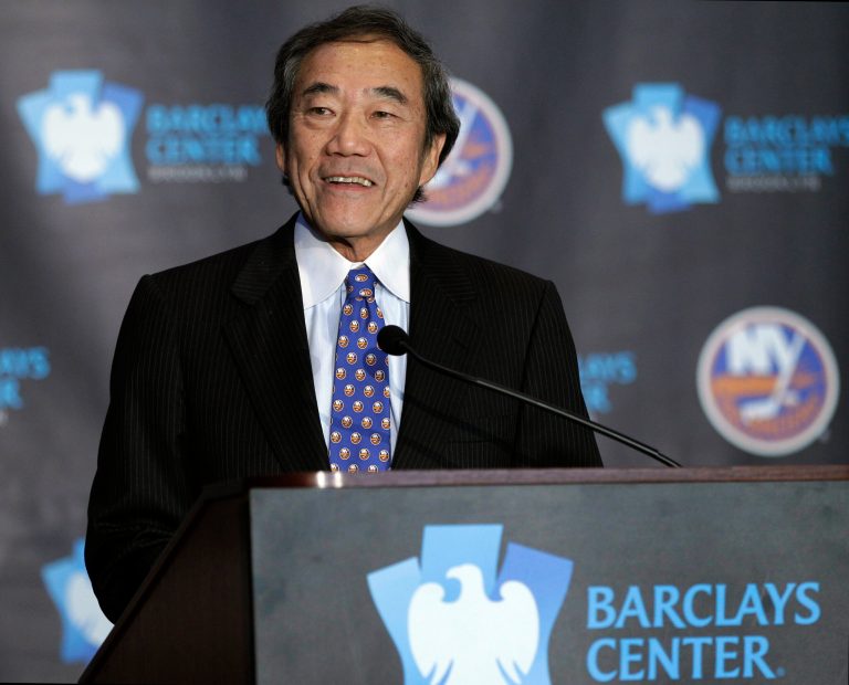 FILE - This is an Oct. 24, 2012, file photo,  showing New York Islanders owner Charles Wang addressing the media during a press conference at Brooklyn's Barclays Center. The New York Islanders have announced that the team is being sold to a former Washington Capitals co-owner and a London-based investor. In a statement Tuesday, Aug. 19, 2014, the team says a group led by former Capitals co-owner Jon Ledecky and investor Scott Malkin has reached an agreement to buy a 
