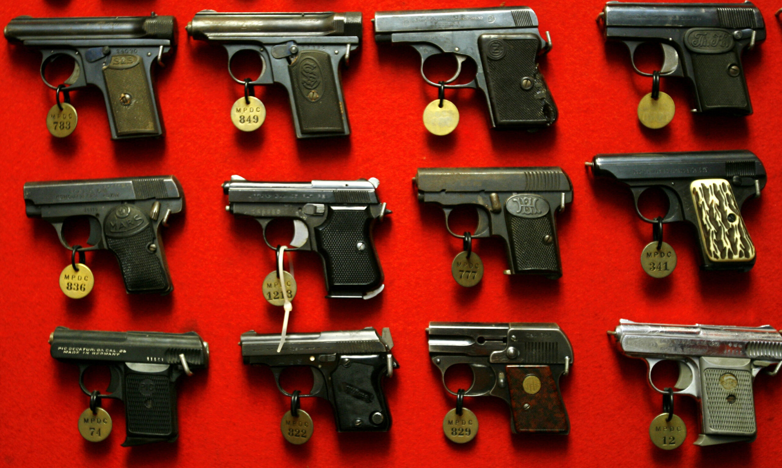 Court strikes down four DC gun control laws