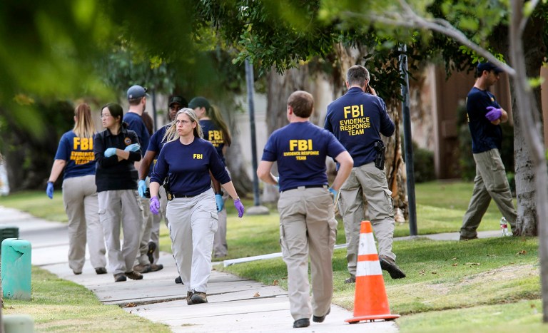 According to a report from WBAL, the search at the Strategic Campaign Group began Thursday afternoon. (AP Photo/Ringo H.W. Chiu)