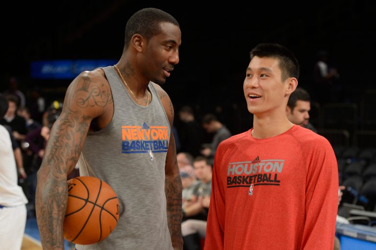   Houston Rockets' Jeremy Lin, right, talks to former New York Knicks teammate Amare Stoudemire before an NBA basketball game at Madison Square Garden in New York, Monday, Dec. 17, 2012. The game marks Lin's return to New York after leaving in the offseason. (AP Photo/Henny Ray Abrams)  