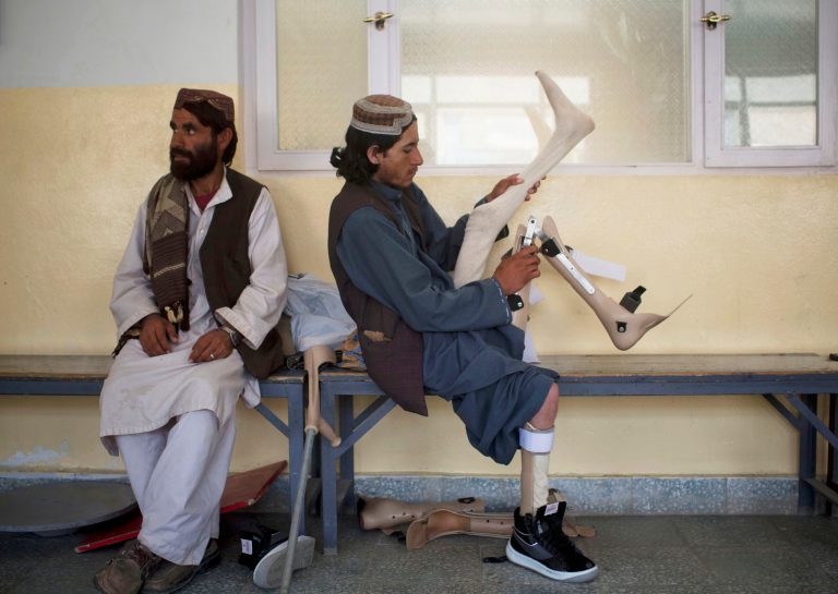   ADVANCE FOR USE MONDAY, JUNE 18, 2012 AND THEREAFTER - In this Sunday, May 27, 2012 photo, Afghan polio victim Musa, right, 15, is accompanied by his older brother, Nordahan, at the ICRC physical rehabilitation center in Kabul, Afghanistan. In February 2012 the world was cheered to learn that India had gone a full year with no new cases of polio - a landmark that left only Pakistan, Afghanistan and Nigeria on the World Health Organization's list of countries where the disease is endemic. But the battle is far from over, judging by the WHO's latest expressions of alarm. It says that in both Nigeria and Afghanistan the number is creeping up, while budget shortfalls are jeopardizing the effort to hold polio at bay in 24 other high-risk countries. (AP Photo/Anja Niedringhaus)  