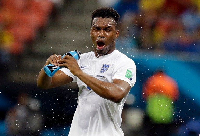 England's Daniel Sturridge douses himself down during the group D World Cup soccer match between England and Italy at the Arena da Amazonia in Manaus, Brazil, Saturday, June 14, 2014.  (AP Photo/Matt Dunham)