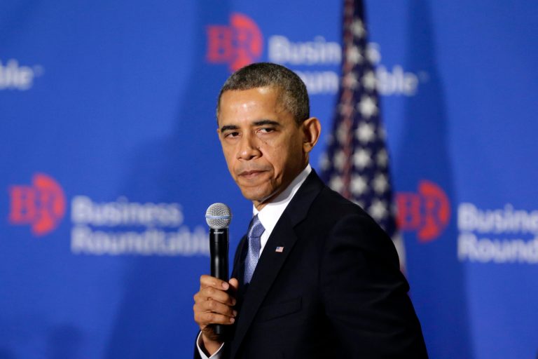   In this Dec. 5, 2012, photo, President Barack Obama pauses as he speaks about the 