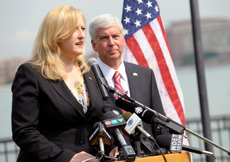 Lisa Raitt, Canada's Minister of Transportation, left, and Michigan Gov. Rick Synder answer questions from reporters during a news conference regarding the planned new $2 billion bridge linking Detroit and Windsor, Ontario, Wednesday, July 30, 2014 in Windsor. Michigan and Canada have appointed members of an authority to oversee construction of the bridge. (AP Photo/Detroit News, Clarence Tabb Jr.)  DETROIT FREE PRESS OUT; HUFFINGTON POST OUT