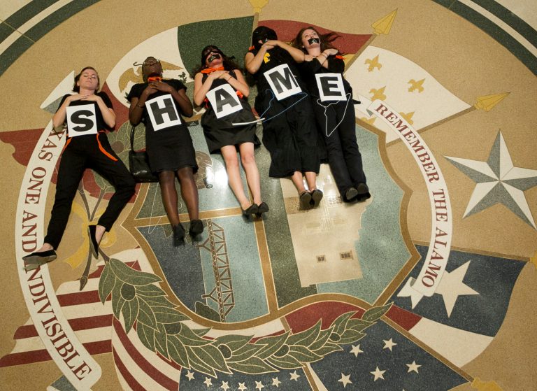 Abortion rights supporters demonstrate outside the Capitol auditorium in Austin, Texas. (AP Photo/Austin American-Statesman, Jay Janner)