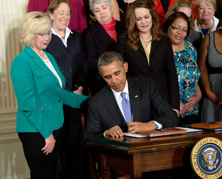 President Obama signs executive actions, with pending Senate legislation, aimed at closing a compensation genderÂ gap that favors men, Tuesday, April 8, 2014. (AP Photo)Â 