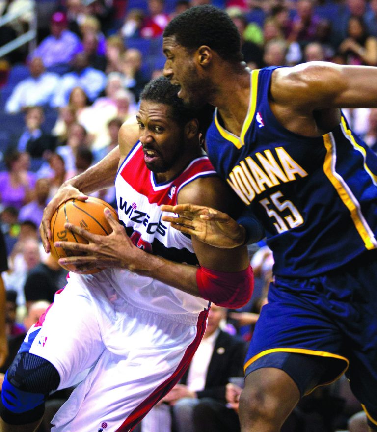 Evan Vucci/AP
Nene averaged 14.5 points and 7.5 rebounds in 11 games with the Washington Wizards last year.
