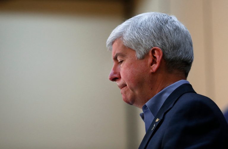 The embattled Republican is expected to take some blame for Flint's lead-contaminated water. (AP Photo/Paul Sancya)