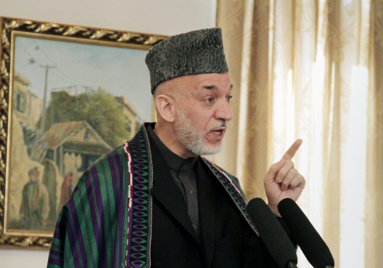   Afghan President Hamid Karzai speaks during a joint press conference with German's President Joachim Gauck, unseen, at the presidential palace in Kabul, Afghanistan, Tuesday, Dec. 18, 2012. German president, Joachim Gauck said that after 2014, Germany we will play a major role in Afghanistan, providing training for the Afghan security forces while helping the Afghan people with development and reconstruction projects. (AP Photo/Ahmad Jamshid)  