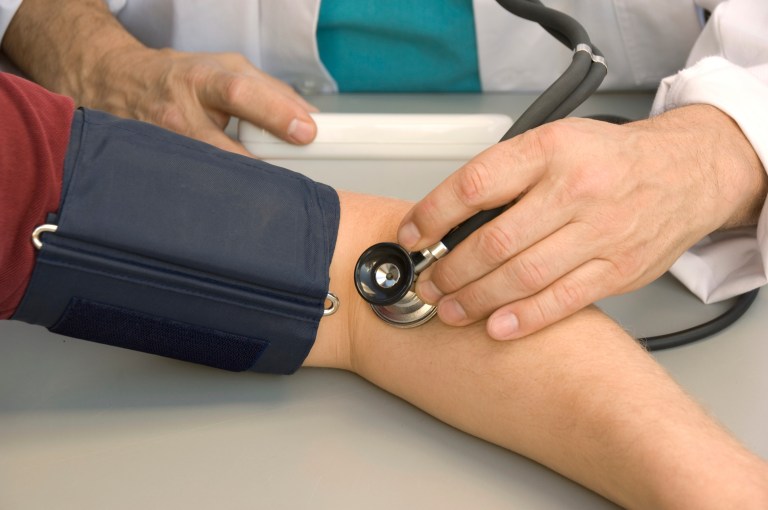 Patient getting blood pressure taken (Examiner file photo)