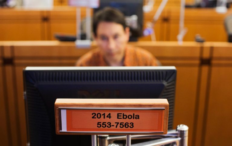 A sign designates a workstation dedicated to Ebola in the Emergency Operations Center at the U.S. Centers for Disease Control and Prevention in August. (AP Photo/David Goldman)