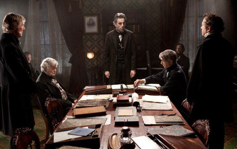   FILE - This undated publicity photo released by DreamWorks and Twentieth Century Fox shows, Daniel Day-Lewis, center rear, as Abraham Lincoln, in a scene from the film, 