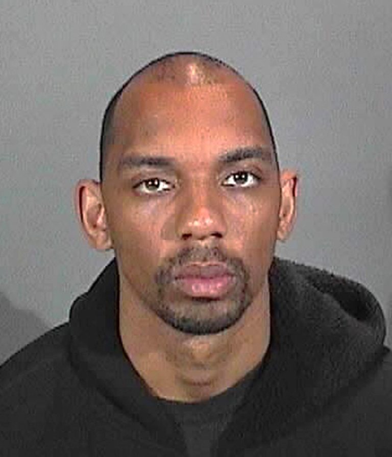   This 2009 photo from the Hermosa Beach, Calif., Police Department shows Brandon Lincoln Woodard. Woodard, 31, was shot in the head Monday, Dec. 10, 2012, in the New York City borough of Manhattan, in what looked like a professional killing. (AP Photo/Hermosa Beach PD)  