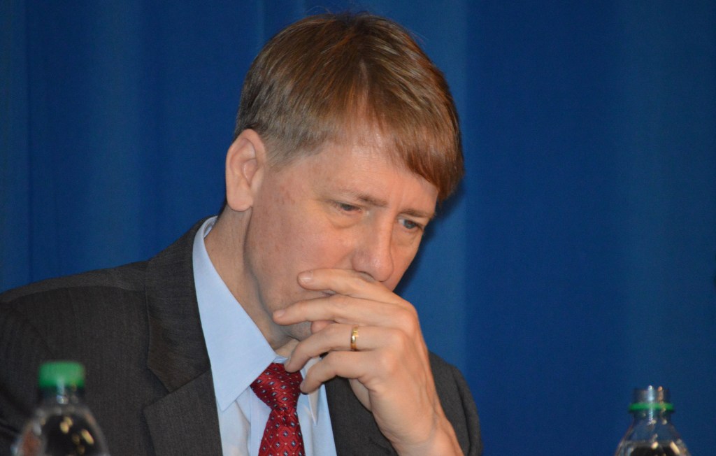 Consumer chief imposed $2.6 billion in regs before court ruling
