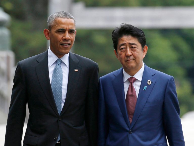 Japanese Prime Minister Shinzo Abe said he lodged a protest to President Obama this week over the alleged rape and murder of a Japanese woman by a civilian worker at a U.S. military base. (Toru Hanai/Pool Photo via AP)