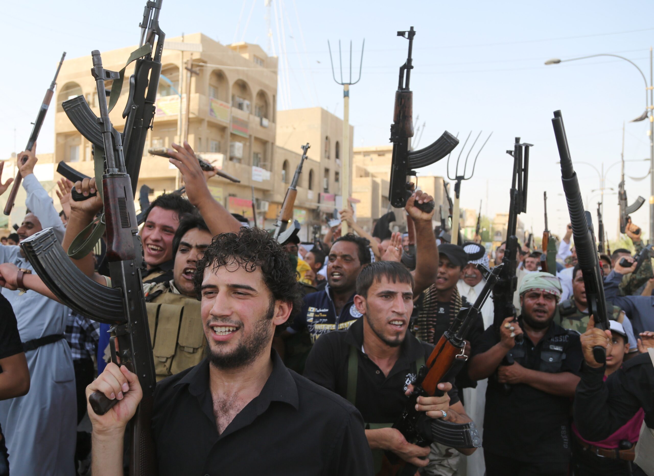 Oil prices slip as US deploys small force to Iraq
