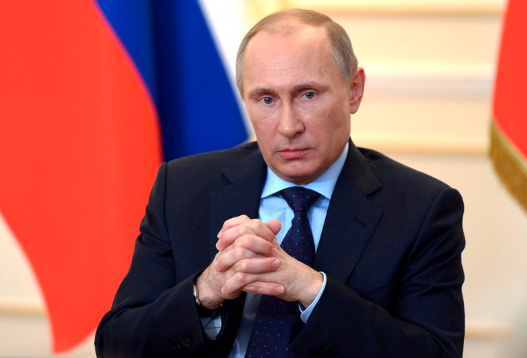 President Vladimir Putin answers journalists' questions on current situation in Ukraine at the Novo-Ogaryovo presidential residence outside Moscow on Tuesday, March 4, 2014. Putin accused the West of encouraging an 