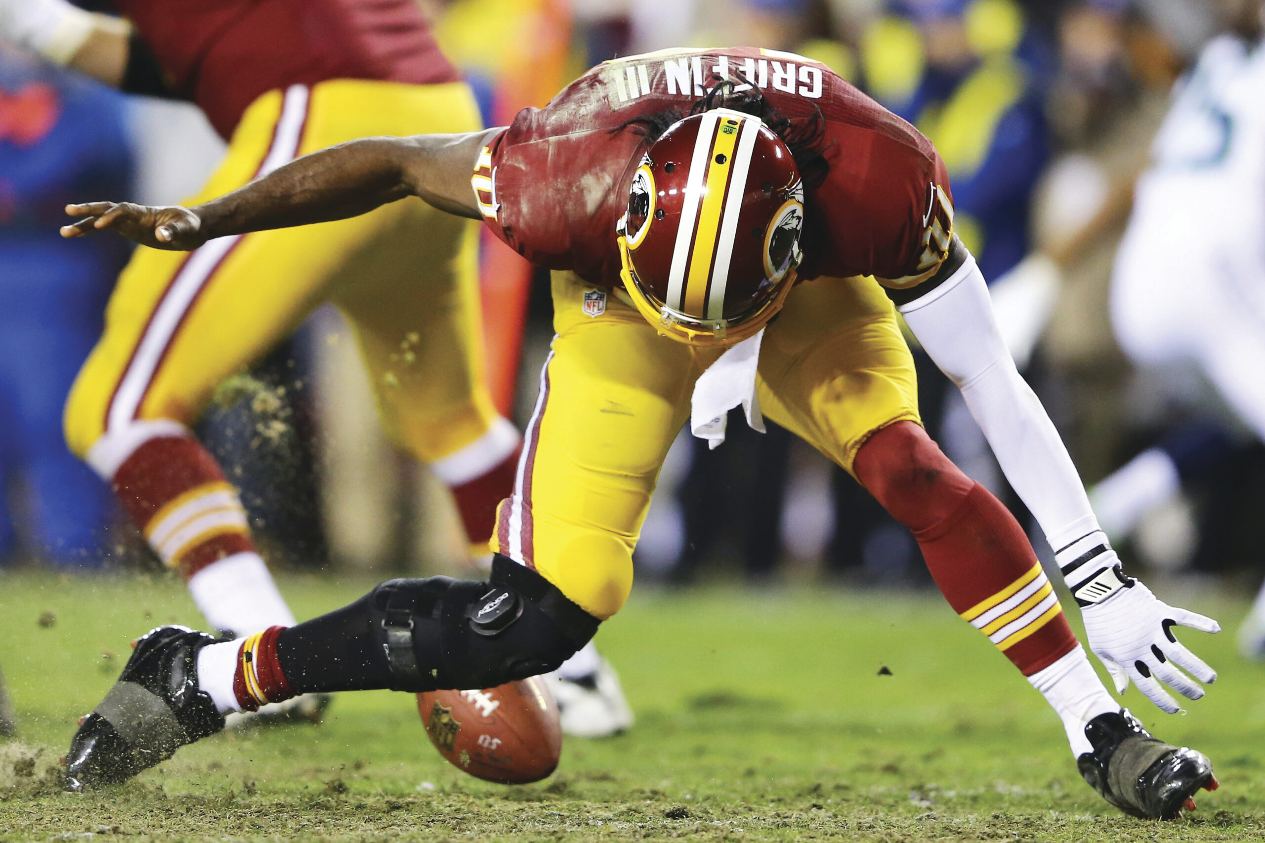Redskins limp out of the playoffs as RG3 is hurt again loss to Seahawks