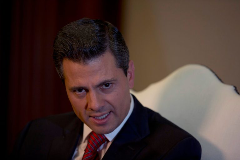   Enrique Pena Nieto speaks during an interview with The Associated Press at the Los Pinos presidential residence in Mexico City, Monday, Dec. 10, 2012. Pena Nieto says he'll mount a 