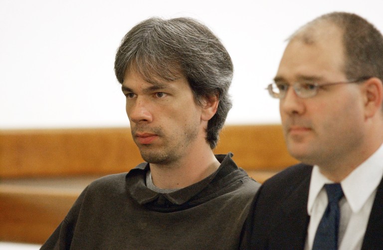   In this Nov. 2000 photo, Dana Martin appears in Vermont District Court in Barre, Vt. Court documents in a New Mexico district court say Dana Martin told investigators he persuaded a man he met in prison and the man's nephew to kill Justin Bieber, Bieber's bodyguard and two others not connected to the pop star. Martin told investigators that Mark Staake and Tanner Ruane headed east, planning to be near a Bieber concert scheduled in New York City. They missed a turn and crossed into Canada from Vermont. Staake was arrested on an outstanding warrant. Ruane was arrested later. The two men face multiple charges stemming for the alleged plot.(AP Photo/Times Argus, Jeb Wallace-Brodeur)  