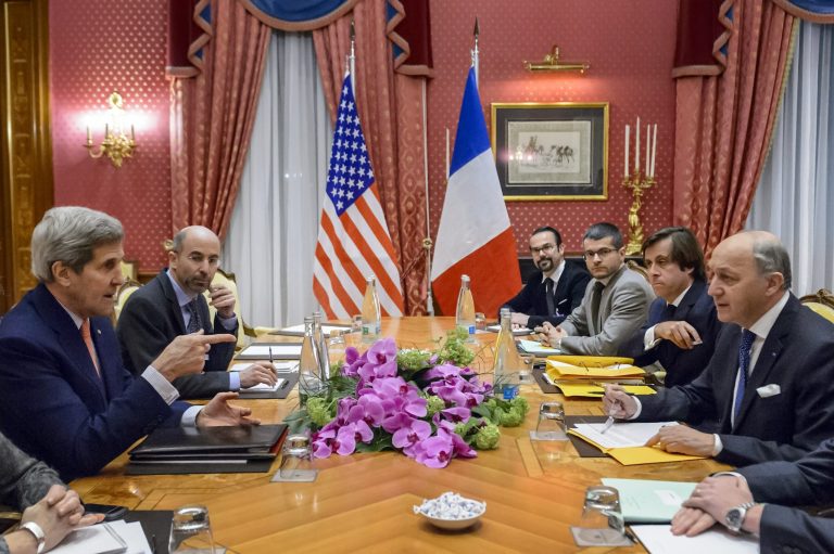 US Secretary of State John Kerry, left, US Secretary of Energy Ernest Moniz, 2nd left, head of the Iranian Atomic Energy Organization Ali Akbar Salehi, 2nd right, and Iranian Foreign Minister Javad Zarif, right, wait at the start of a meeting at the Beau Rivage Palace Hotel, in Lausanne, Switzerland, Saturday March 28, 2015. (AP Photo/Brendan Smialowski, Pool)