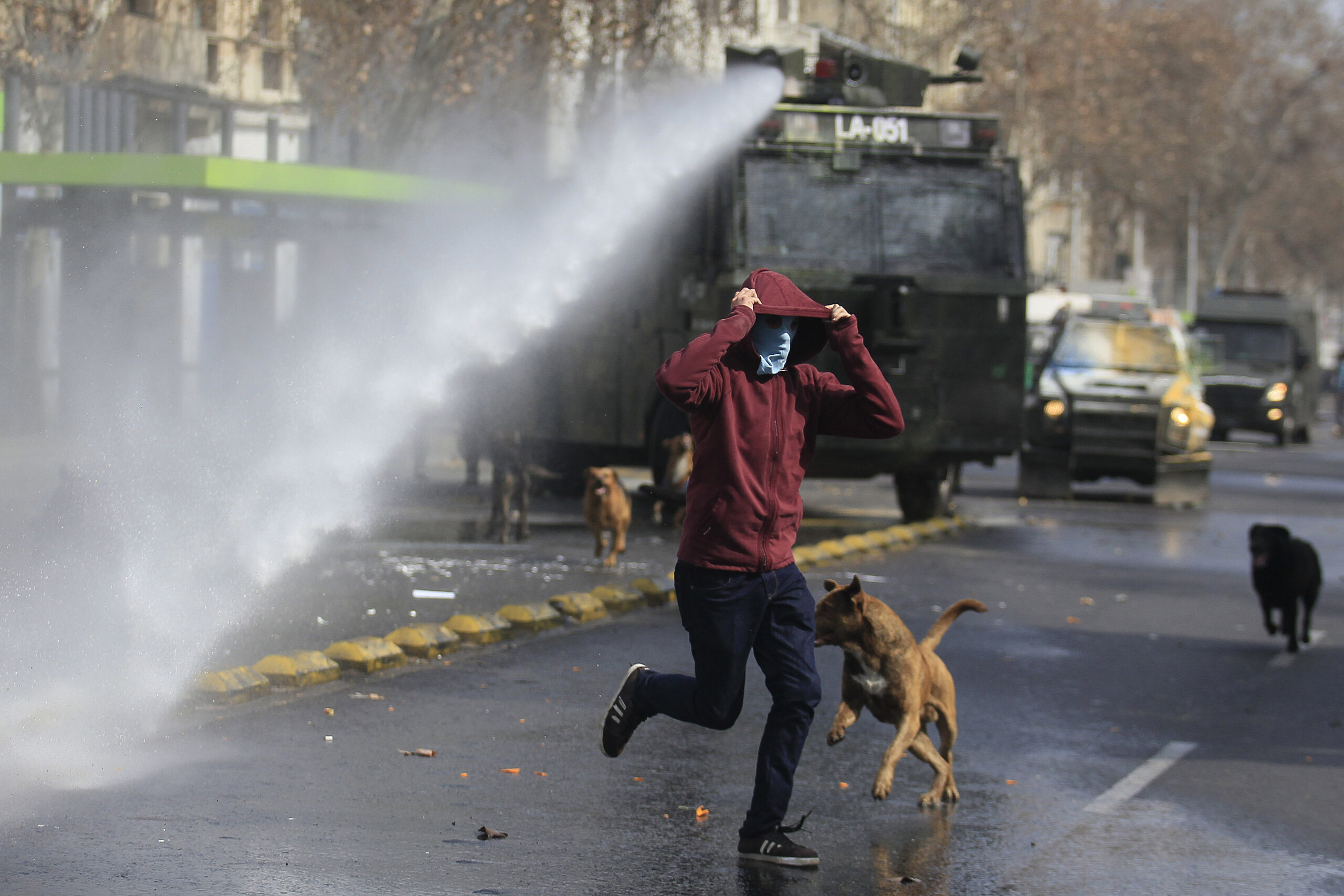 Police tear gas, water cannons at Chilean protest