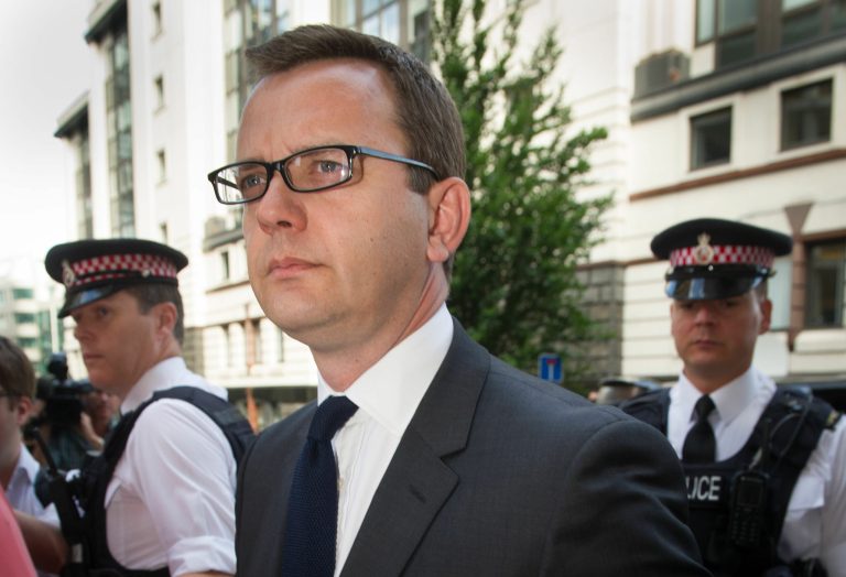 Former News of the World editor Andy Coulson arrives at the Old Bailey court to be sentenced,  in London,  Friday, July 4, 2014. Coulson, 46, has been found guilty of being involved in the conspiracy to hack into the phone voicemails of many celebrities, royals, politicians and ordinary members of the public, at the now-closed British Sunday tabloid newspaper. Coulson has been sentenced to 18 months in jail. (AP Photo/PA, Stefan Rousseau) UNITED KINGDOM OUT NO SALES NO ARCHIVE