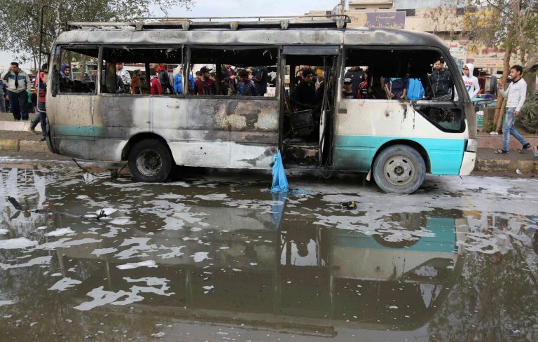 Terrorist group planted car bomb that exploded in Baghdad's Sadr City district. (AP Photo/ Karim Kadim)