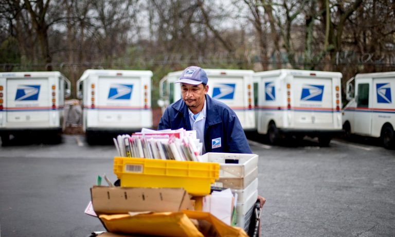 U.S. Postal Service officials caved to congressional pressure this week and dropped their plan to end Saturday delivery.  (AP Photo/David Goldman)