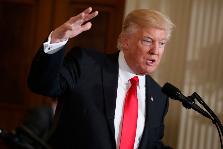 A bipartisan group of senators have offered a bill that would give Congress a chance to block any sanctions lifted by Trump. (AP Photo/Evan Vucci)