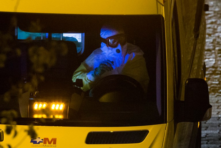 An ambulance transporting a Spanish nurse who believed to have contracted the ebola virus from a 69-year-old Spanish priest leaves Alcorcon Hospital in Madrid, Spain, Tuesday, Oct. 7, 2014. The nurse who treated a missionary for the disease at a Madrid hospital tested positive for the virus, Spain's health minister said Monday. The female nurse was part of the medical team that treated a 69-year-old Spanish priest who died in a hospital last month after being flown back from Sierra Leone, where he was posted. (AP Photo/Andres Kudacki)