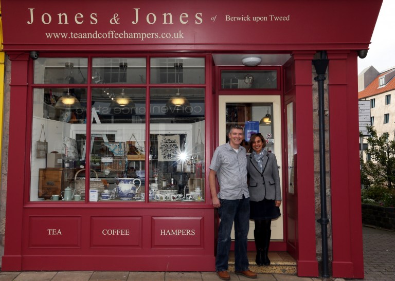 Business owners Gavin and Gail Jones at their shop which sells products from Scotland and England in Berwick Upon Tweed, England, Monday, Sept. 8, 2014.The British government plans to offer Scotland more financial autonomy in the coming days as polls predict a very close vote in the September 18 referendum on Scottish independence. (AP Photo/Scott Heppell)