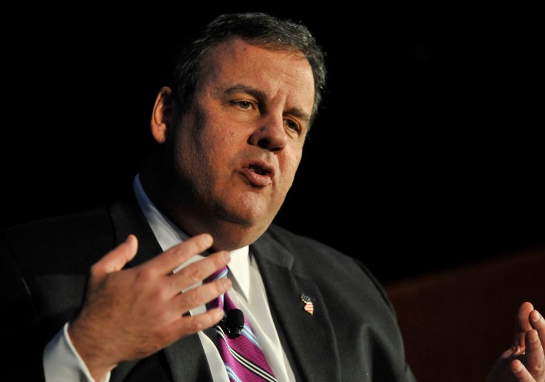 New Jersey Gov. Chris Christie received a standing ovation during a New Jersey town hall Tuesday after suggesting that American's needed to elect a new president to get rid of Obamacare. (AP Photo/Paul Beaty)