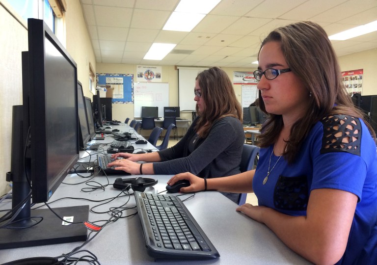 A study shows students who take an extra career and technical education course are more likely to graduate from high school, get a job after high school and get higher pay in that job. (AP Photo/Christine Armario)