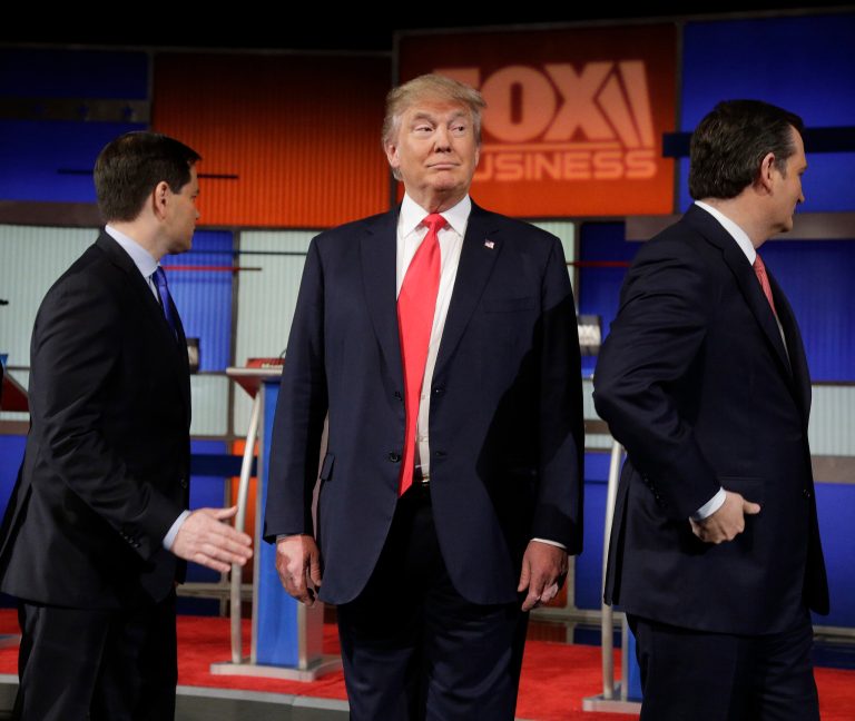 In the final half or so, candidates began to really debate each other about their differences over Muslim bans, Chinese tariffs and economic policy. (AP Photo)